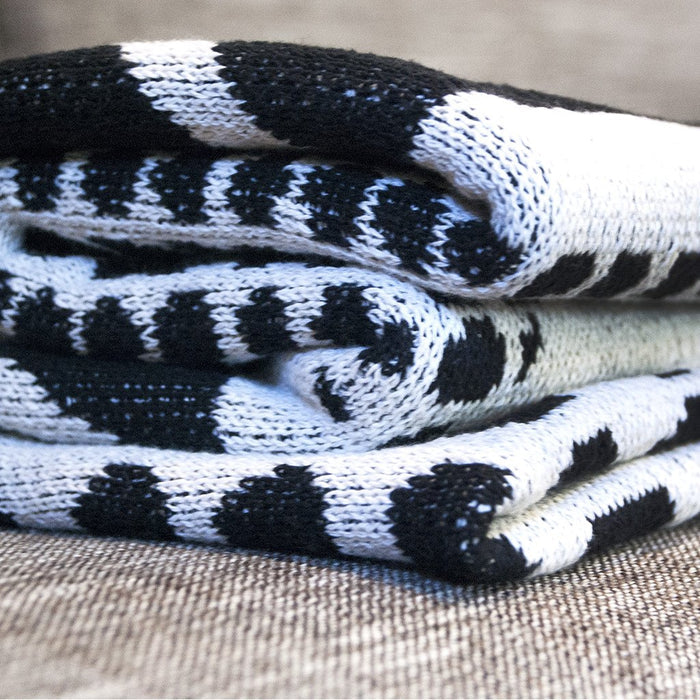 Seek-and-swoon-throw-blanket-adobe-deco
