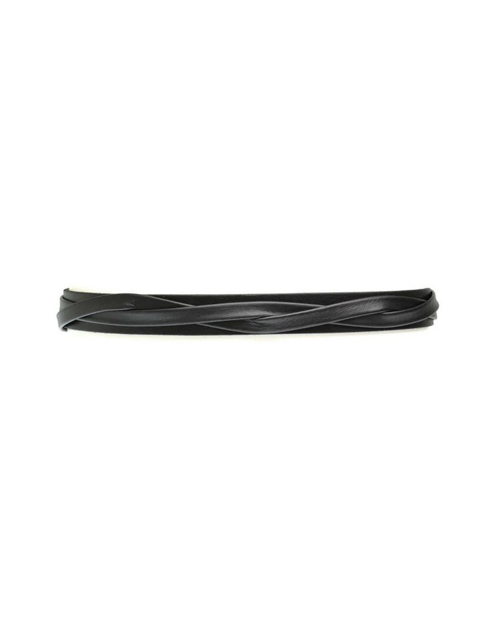 The ADA - SKINNY WRAP BELT by ADA, made from genuine Argentinian leather with a simple twisted design, is coiled into a circle on a plain white background.