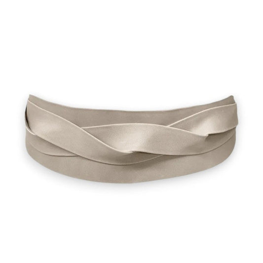 A close-up of the ADA - WRAP LEATHER BELT by ADA, crafted from distressed leather and highlighting its distinctive texture and waxed finish.