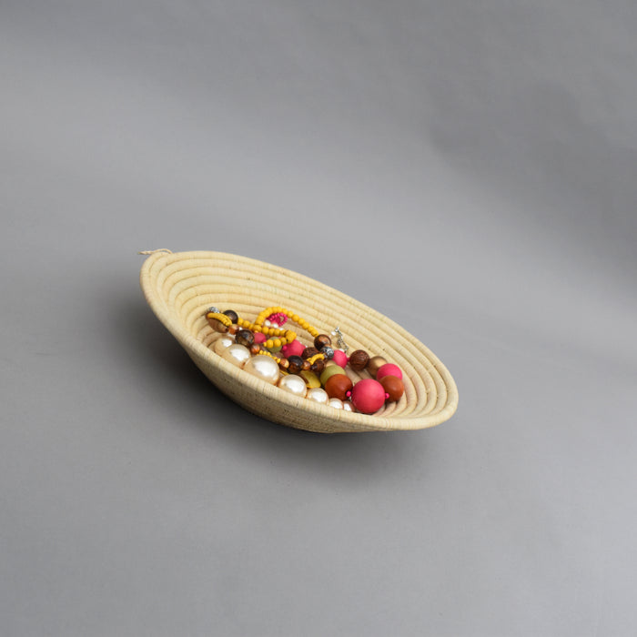 Hand woven straw. A tradition and art which has been part of Ugandan culture for centuries.  With all of the materials used being natural products or recycled, we also believe this is a lovely way of making use of natural resources the world has to offer and making positive changes to become more sustainable.  Beautifully, unique, handmade basket made out of banana stalks and raffia fibres also known as the Ugandan basket.