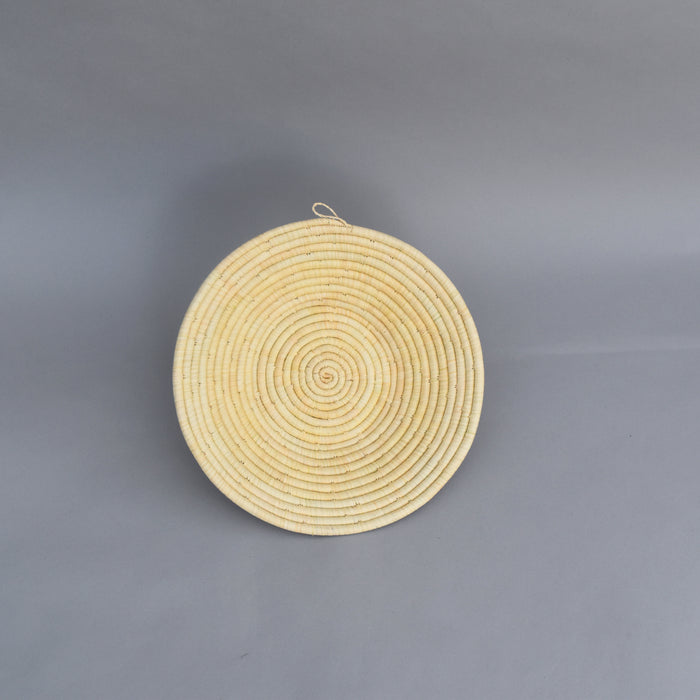 Hand woven straw. A tradition and art which has been part of Ugandan culture for centuries.  With all of the materials used being natural products or recycled, we also believe this is a lovely way of making use of natural resources the world has to offer and making positive changes to become more sustainable.  Beautifully, unique, handmade basket made out of banana stalks and raffia fibres also known as the Ugandan basket.