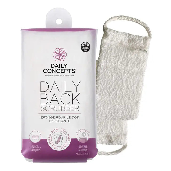 A packaged DAILY CONCEPTS BACK SCRUBBER, a white cleansing tool with two handles, is shown next to its white and purple-accented box displaying product information.