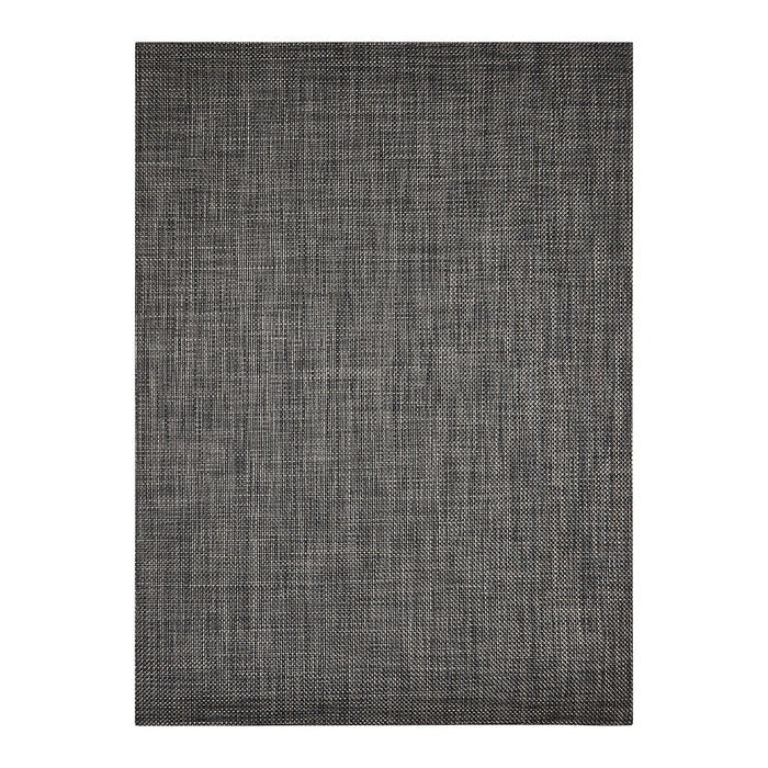 The CHILEWICH - BASKETWEAVE FLOORMAT by CHILEWICH is a rectangular area rug in dark gray and black, featuring a woven, crosshatch basketweave texture for a modern look with straight edges and no visible border.