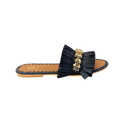 Add a touch of sparkle to any summer outfit with the DA SIENA - RAFFIA SLIDES WITH CRYSTALS by DE SIENA, featuring a tan sole, black ruffled strap, and gold jeweled embellishments atop the strap.