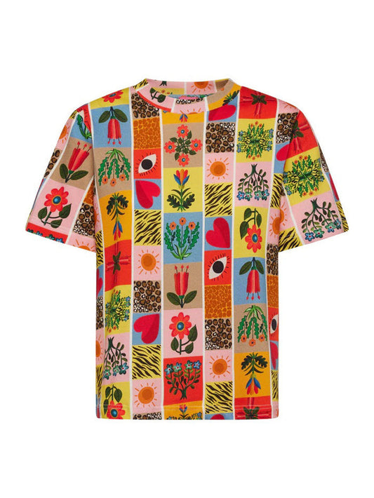The FRANCO FERRARI PRINT COTTON T-SHIRT combines artistic flair with a colorful geometric star pattern in white, teal, orange, and blue on an orange background, making it ideal for elevated casual wear.