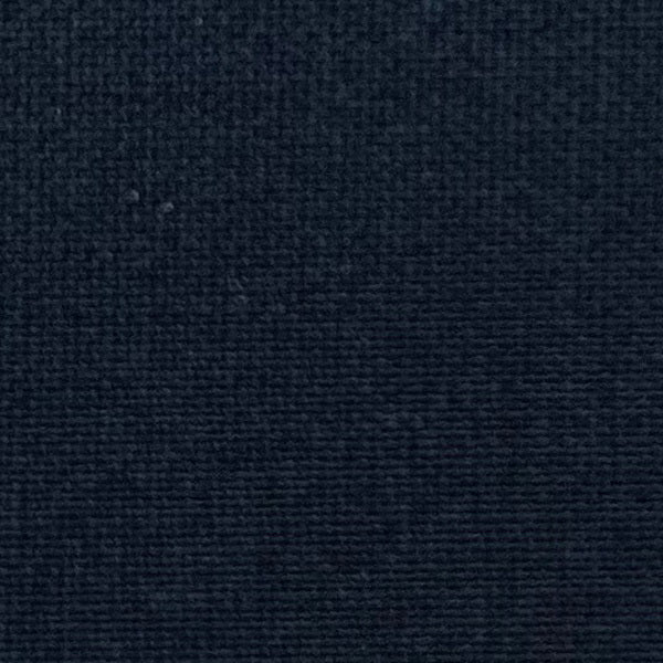 Close-up of MEIMEIJ Plisse Sleeveless Top's dark textured fabric displays a finely woven pattern. The consistent monochrome color and texture, with subtle weave variations, reflect minimalist elegance.