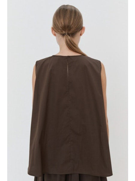 A close-up of the MEIMEIJ Sleeveless Cotton Top reveals dark cotton poplin fabric with textured, subtle horizontal lines and a slightly uneven surface in a deep, muted purple shade.