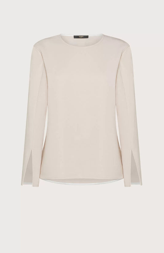 The SEVENTY Stretch Crewneck Viscose Top with Sleeve Detail is a light beige, long-sleeve shirt featuring a simple and elegant design. Made in Italy, this sophisticated top has slightly flared sleeves with subtle slits near the cuffs and a relaxed fit. Crafted from stretch viscose cady, it hangs straight for a minimalistic and refined appearance.