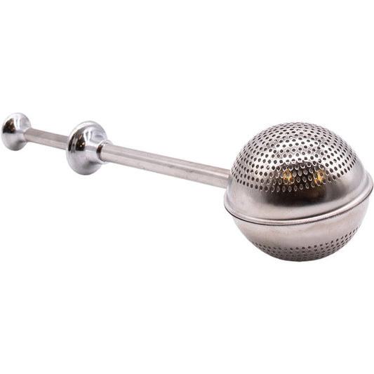 THE CHAI BOX - TEA STEEPER by THE CHAI BOX features a stainless steel design with an extended handle and a round, perforated chamber, ideal for holding loose leaf teas, spices, or fruits—making it easy to brew your favorite flavors.