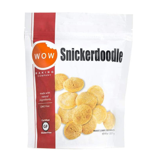 A white and red WOW BAKING COMPANY Gluten Free Snickerdoodle Cookie Pouch, showing images of soft cookies and labels for "Gluten Free," "GMO Free," and "Made with Natural Ingredients" on the front.