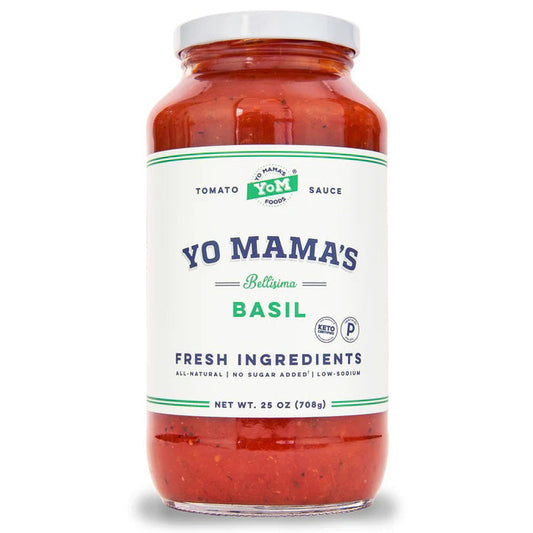A 25 oz (708g) jar of YO MAMA'S - BELLISIMA BASIL SAUCE by YO MAMA'S FOODS, featuring a white label with green and blue text, "Fresh Ingredients," and "No Sugar Added." Keto certified basil pasta sauce.